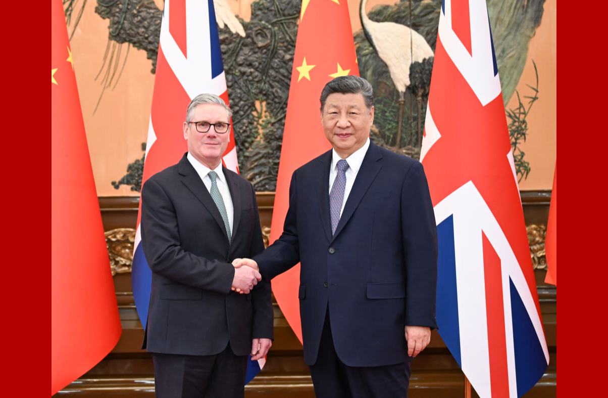 习近平会见英国首相斯塔默