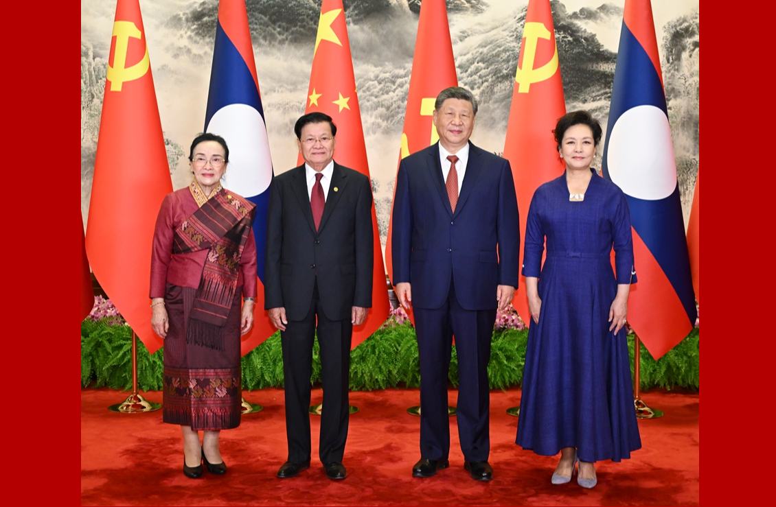 习近平同老挝人革党中央总书记、国家主席通伦会谈