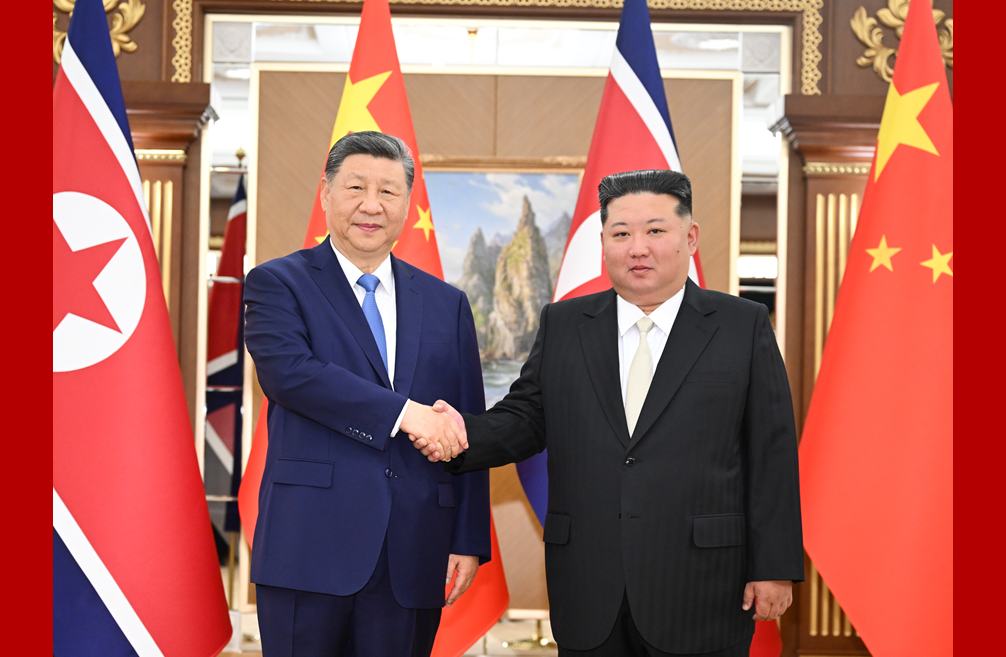 习近平同金正恩举行会谈